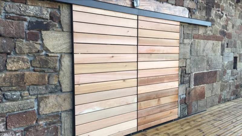 Vente et pose de volets coulissants en bois à Sarlat-la-Canéda (24) en Dordogne