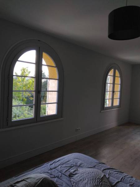 Menuiseries en bois cintrées sur mesure